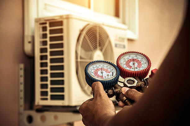 Professional Air Conditioning Service technician working in Frankfort, NY